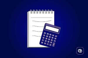 Caderno e calculadora sobre fundo azul